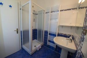 a bathroom with a shower and a sink at B&B Planizie in Corridonia