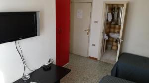 Posezení v ubytování Albergo Le Rose