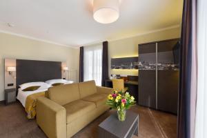Kuchyň nebo kuchyňský kout v ubytování Hôtel Bellerive