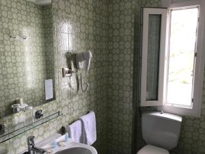 Koupelna v ubytování Hotel Roca