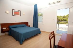 Postel nebo postele na pokoji v ubytování Hotel Roca + 37 fotografií