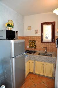 Villino Belvedereにあるキッチンまたは簡易キッチン