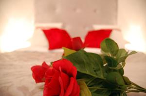 A bed or beds in a room at Casa del Bernini