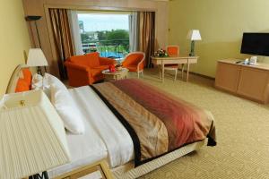 Voodi või voodid majutusasutuse Grand Darul Makmur Hotel Kuantan toas
