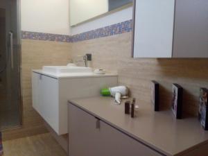 Kuchyň nebo kuchyňský kout v ubytování Relais Villa Lézard