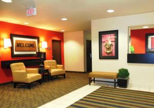 a waiting room with chairs and a waiting room at Extended Stay America Suites - Savannah - Midtown in Savannah