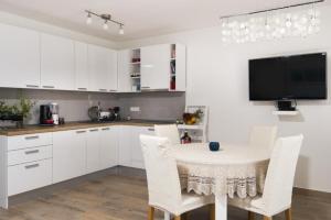 Kuchyň nebo kuchyňský kout v ubytování Apartment Mediterraneo