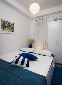 Postel nebo postele na pokoji v ubytování Apartment Mediterraneo