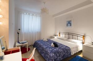 Postel nebo postele na pokoji v ubytování Apartment Mediterraneo