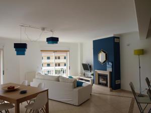 Posezení v ubytování Apartment Ericeira