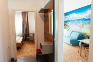 Aparthotel Heuberger客房内的一张或多张床位