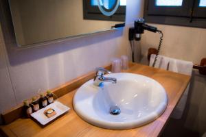 Ein Badezimmer in der Unterkunft Hotel Plaza