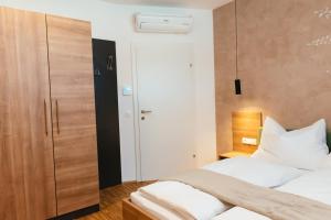 Aparthotel Heuberger客房内的一张或多张床位