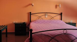 Postel nebo postele na pokoji v ubytování Ilias Studios - Rooms