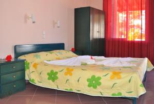 Postel nebo postele na pokoji v ubytování Ilias Studios - Rooms