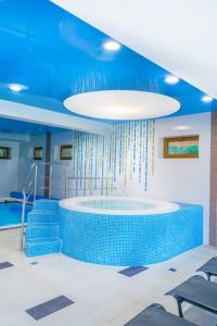 Bazén v ubytování Horský Hotel Kristína nebo v jeho okolí
