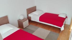 Posteľ alebo postele v izbe v ubytovaní Apartments Šuperba