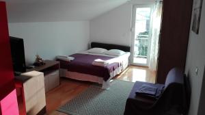 Posteľ alebo postele v izbe v ubytovaní Apartments Šuperba