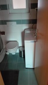 Kúpeľňa v ubytovaní Apartments Šuperba
