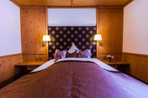 Postel nebo postele na pokoji v ubytování Hotel Kandler + 20 fotografií