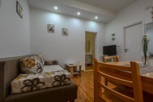 Μια τηλεόραση ή/και κέντρο ψυχαγωγίας στο Apartment Vicenco top location