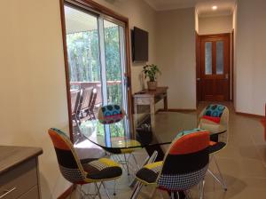 A seating area at Mistinthegumtrees Eco Luxury Cabins