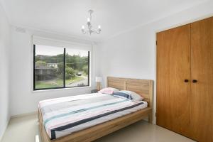 Cama ou camas em um quarto em Fairhills - beautifully styled