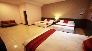 Postel nebo postele na pokoji v ubytování Liwu Hotel Taroko