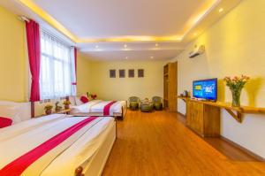 Letto o letti in una camera di Mengyuanju Boutique Inn