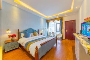 Letto o letti in una camera di Mengyuanju Boutique Inn