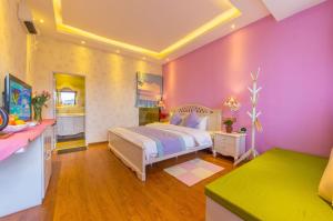 Letto o letti in una camera di Mengyuanju Boutique Inn