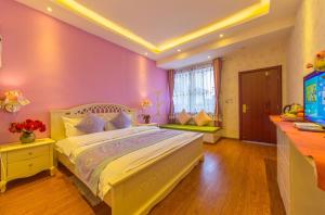 Letto o letti in una camera di Mengyuanju Boutique Inn