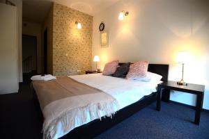 Postel nebo postele na pokoji v ubytování Hotel Biscuit + 37 fotografií
