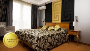 Giường trong phòng chung tại Duna Relax Hotel Ráckeve
