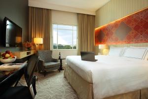 Letto o letti in una camera di Rendezvous Hotel Singapore by Far East Hospitality