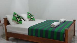 Postel nebo postele na pokoji v ubytování Leesa Villa Safari Resort