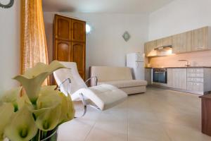 Kuchyň nebo kuchyňský kout v ubytování Apartments Gloria