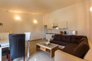 Kuchyň nebo kuchyňský kout v ubytování Apartments Gloria