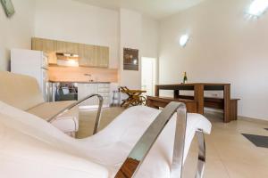 Kuchyň nebo kuchyňský kout v ubytování Apartments Gloria