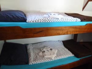 two bunk beds with towels on top of them at MPS Waterland Amsterdam in Amsterdam