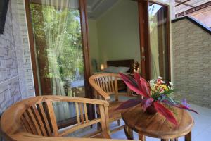Balkón nebo terasa v ubytování Teba Jati Guest House