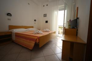 A television and/or entertainment centre at Hotel Lugano