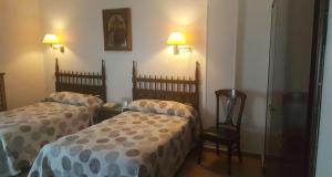 Postel nebo postele na pokoji v ubytování Hotel Nico