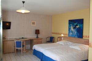 Postel nebo postele na pokoji v ubytování Hotel Des Bains