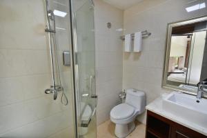 Koupelna v ubytování Arirang Hotel