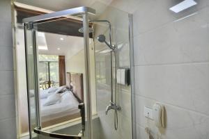 Koupelna v ubytování Arirang Hotel
