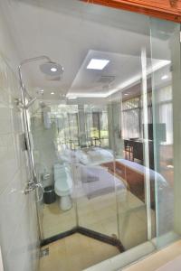 Koupelna v ubytování Arirang Hotel
