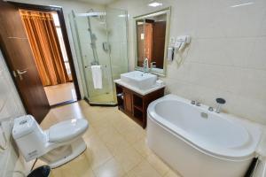 Koupelna v ubytování Arirang Hotel