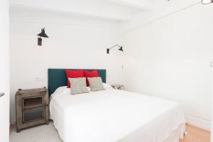 Un pat sau paturi într-o cameră la Bon Viure