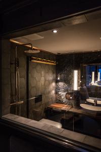 Phòng tắm tại HUUS Gstaad
